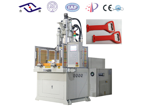 一款開瓶器包膠立式注塑機成型神型